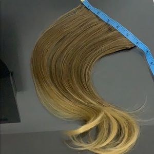 Woman’s Blond Hair Extension.